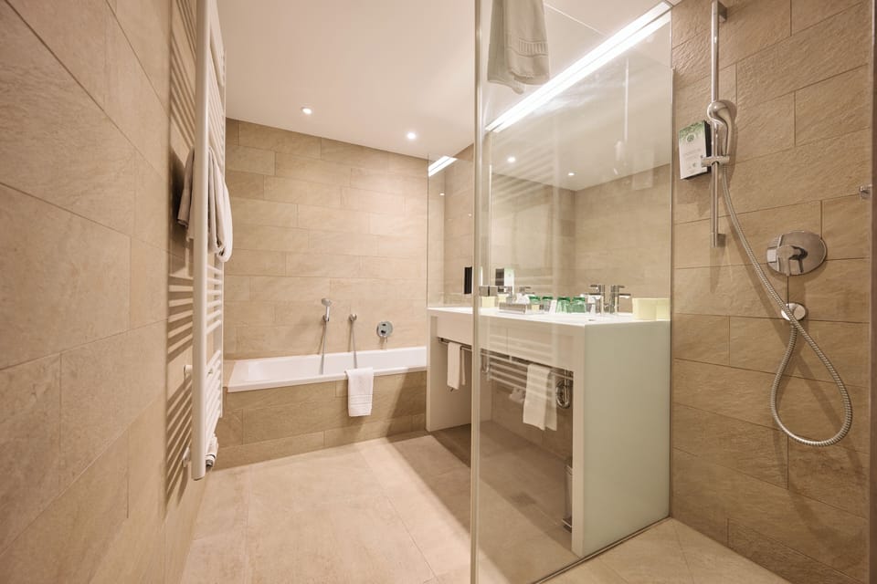 Junior Suite, Balcony, Mountain View | Bathroom | Shower, hair dryer, towels