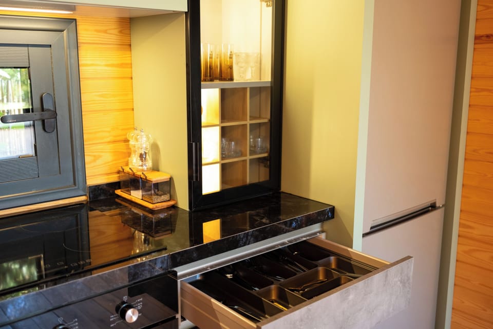 Apartment, Garden View | Private kitchen | Full-size fridge, oven, stovetop, dishwasher