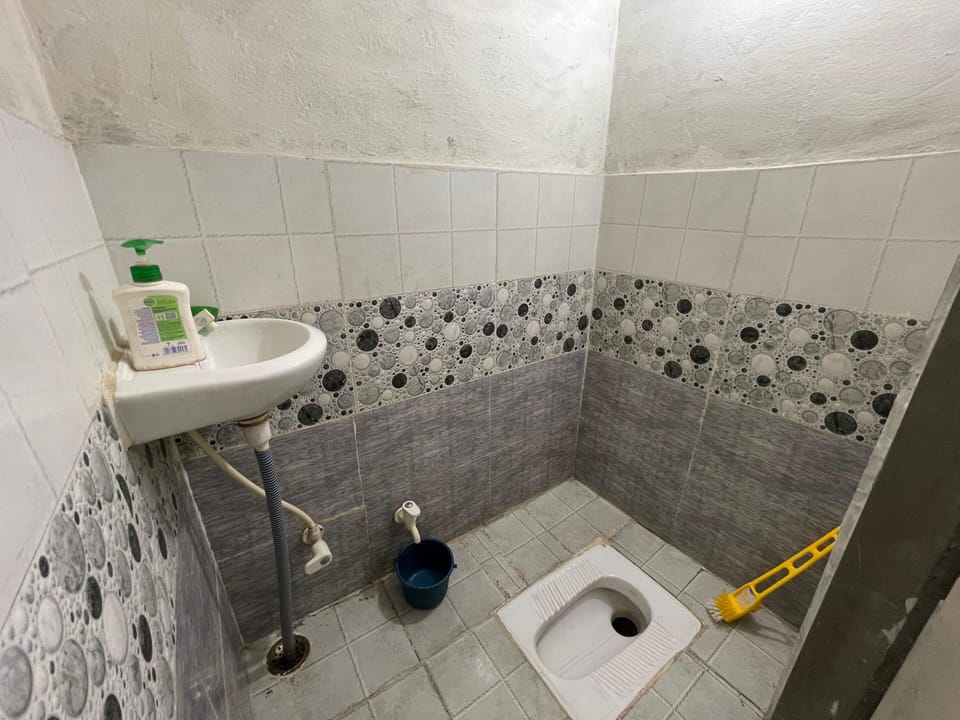 Bathtub, slippers, soap, shampoo