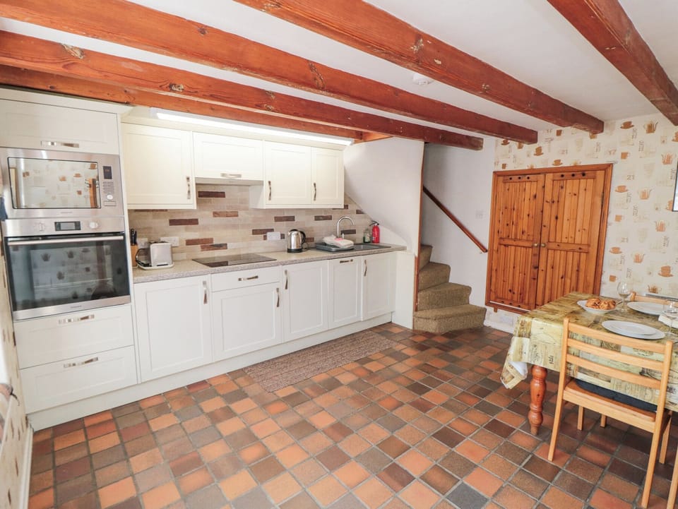 Fridge, microwave, cookware/dishes/utensils
