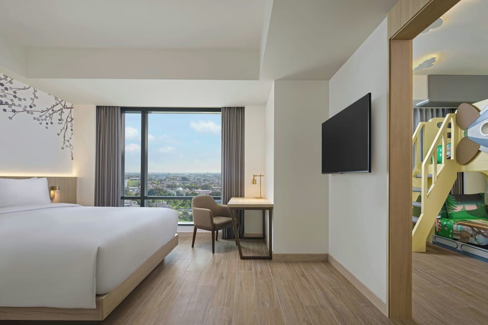 Family Suite, 2 Bedrooms, Pool Access | In-room safe, desk, laptop workspace, free WiFi