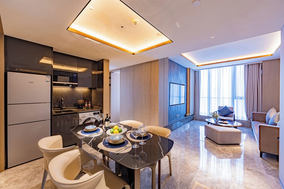 Luxury Suite, City View | Living area | LCD TV