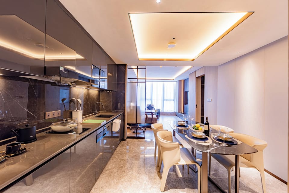 Luxury Condo, City View | Private kitchen | Fridge, microwave, stovetop