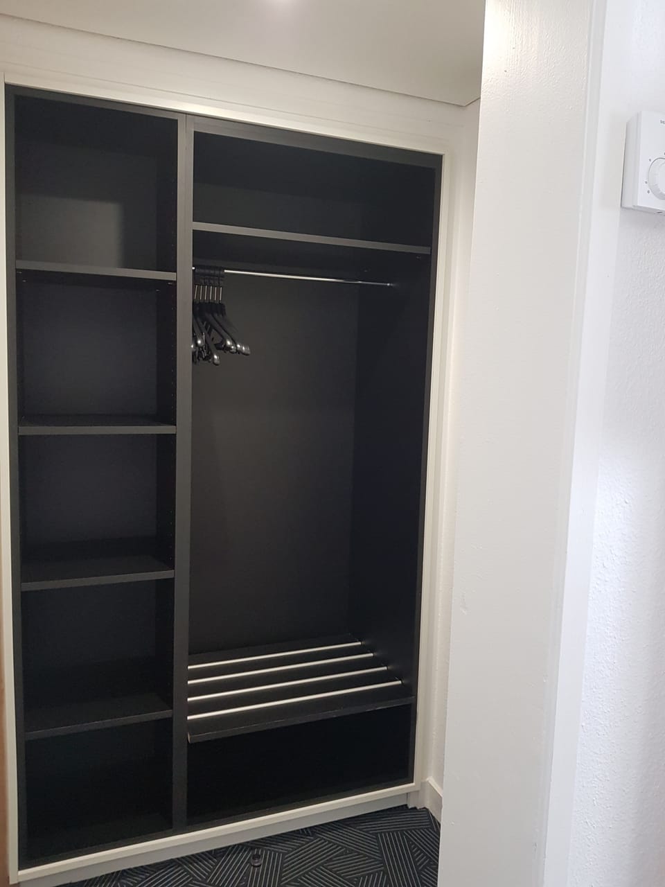 Desk, laptop workspace, blackout drapes, soundproofing