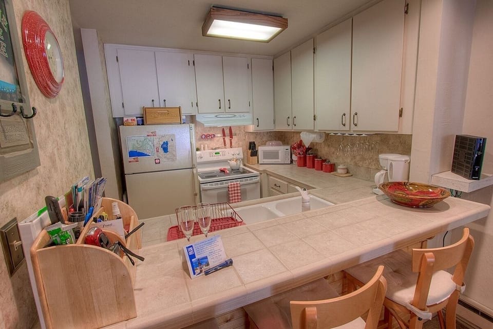 Condo, 2 Bedrooms | Private kitchen | Coffee/tea maker, fridge, oven, toaster