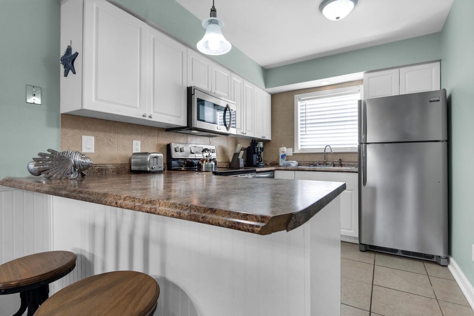 Condo, Multiple Beds (Villas on the Gulf unit D2) | Private kitchen | Oven, toaster