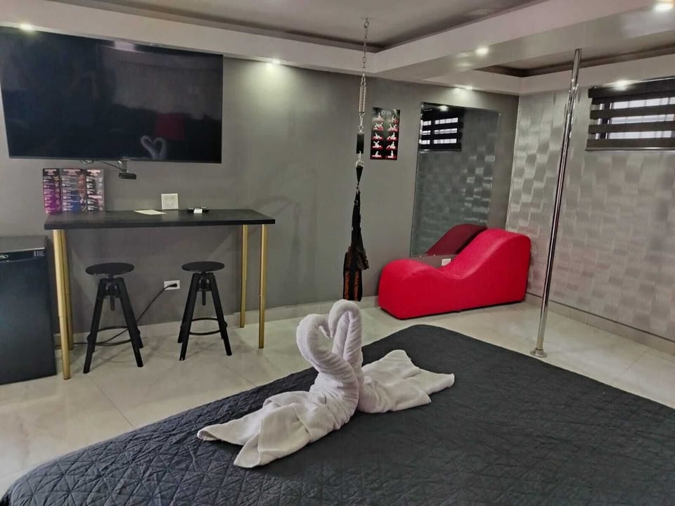 Deluxe Room, 1 Bedroom | Laptop workspace, blackout drapes, iron/ironing board, free WiFi