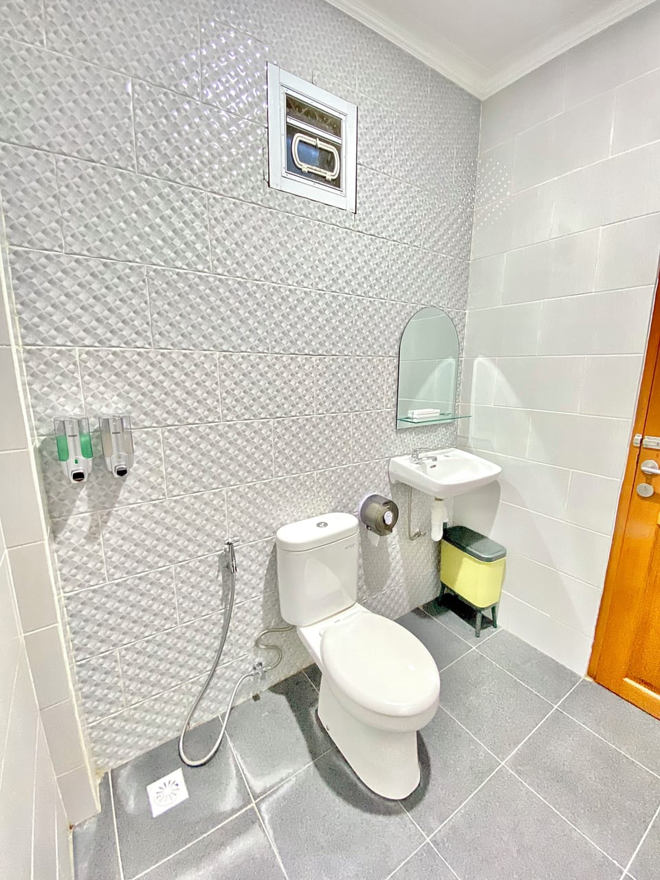 Shower, rainfall showerhead, hair dryer (on request), bidet