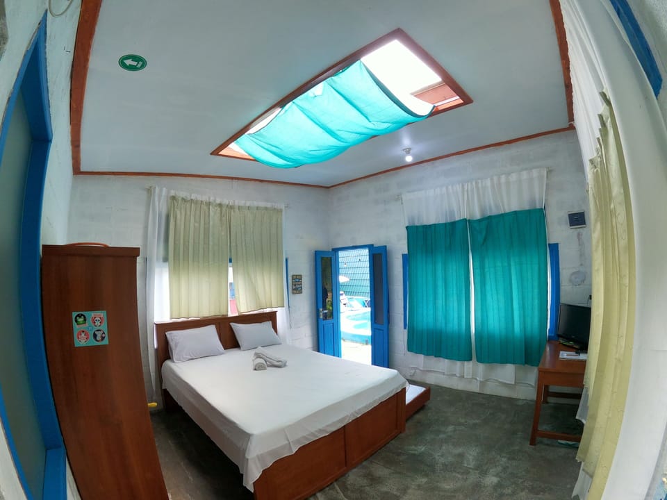 Comfort Triple Room, Balcony, Garden View | Laptop workspace