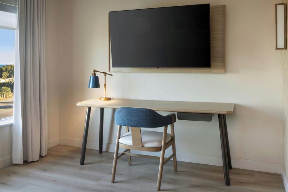 Suite, 1 King Bed with Sofa bed, Ocean View | Desk, laptop workspace, blackout drapes, iron/ironing board