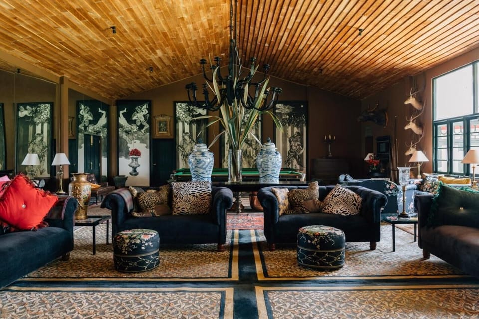 Deluxe Double Room, Patio, Garden View | Living area