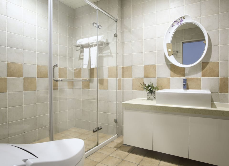 Quadruple Room, 2 Double Beds | Bathroom | Shower, hydromassage showerhead, hair dryer, slippers