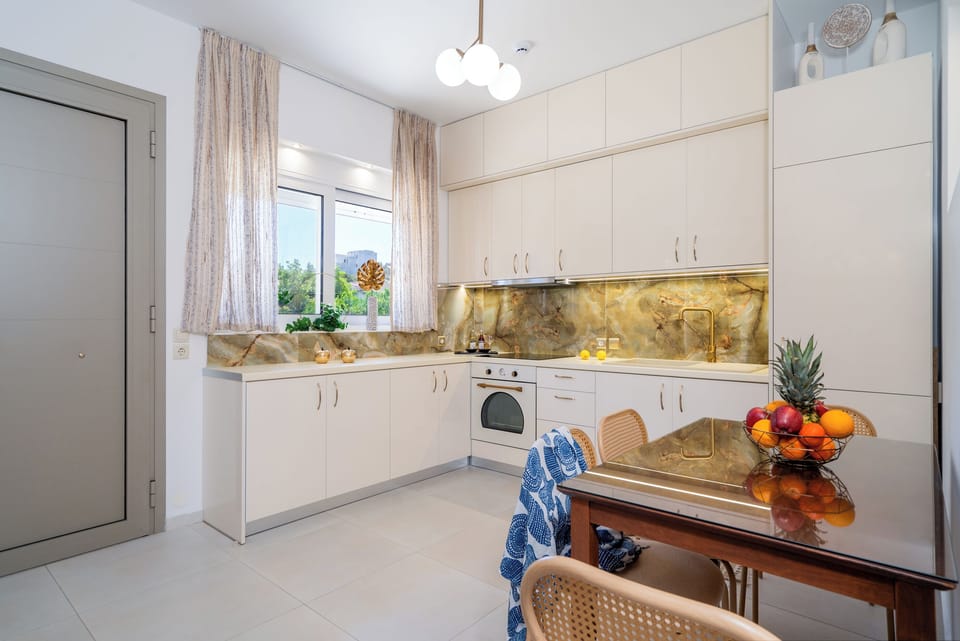 Apartment, 2 Bedrooms, Patio | Private kitchen | Full-size fridge, oven, stovetop, coffee/tea maker