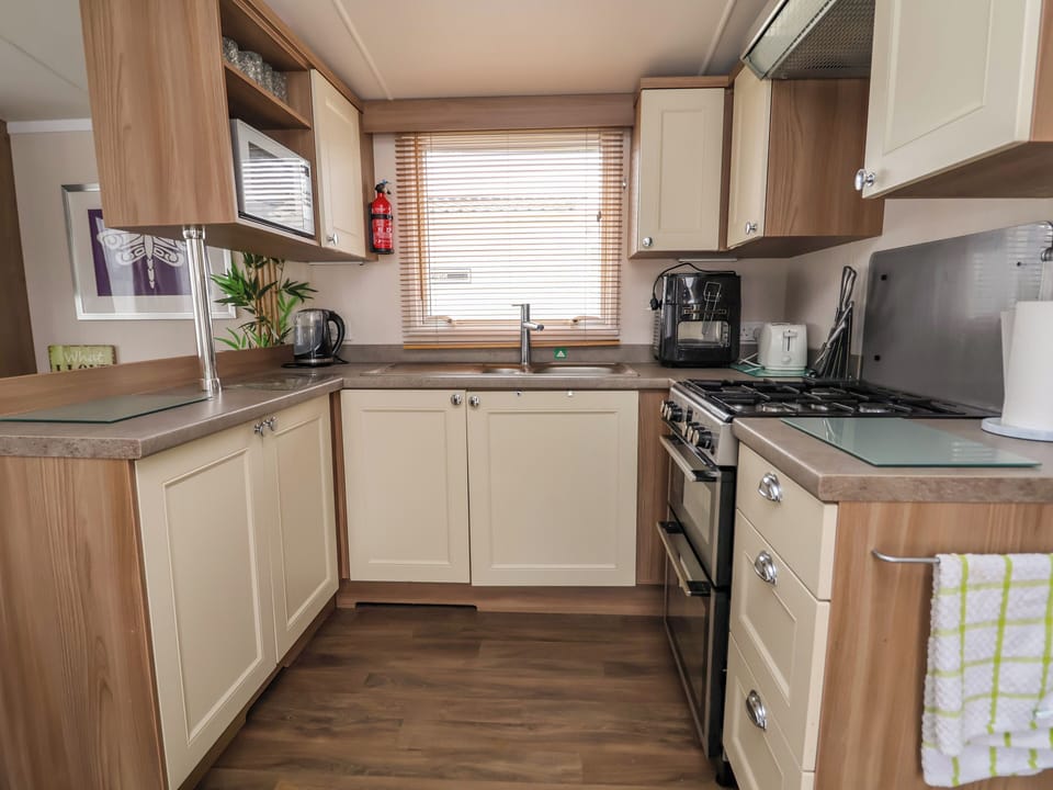 Fridge, microwave, cookware/dishes/utensils