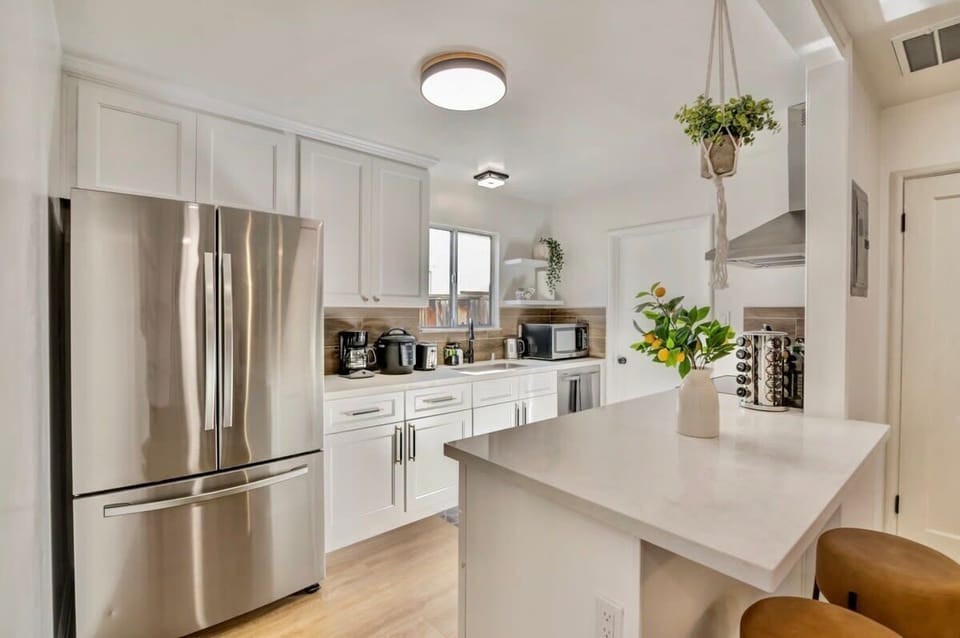 House (4 Bedrooms) | Private kitchen | Oven, espresso maker, coffee/tea maker, electric kettle