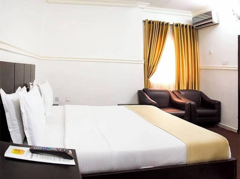Economy Room, Balcony, City View | Desk, laptop workspace, blackout drapes, soundproofing