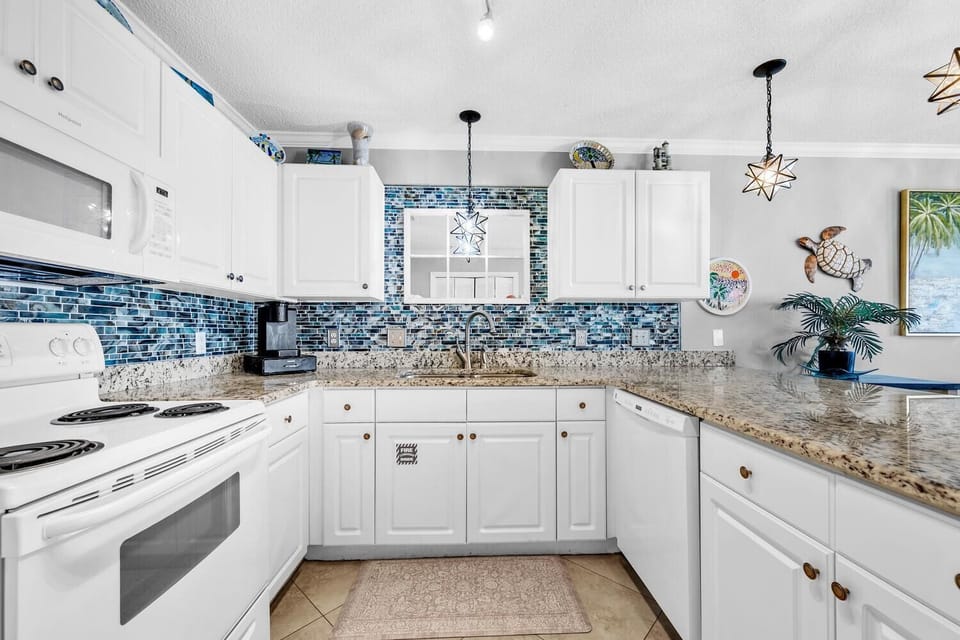 Condo, Multiple Beds (Gulf Place Caribbean 313- Sunsets on ) | Private kitchen | Oven, toaster