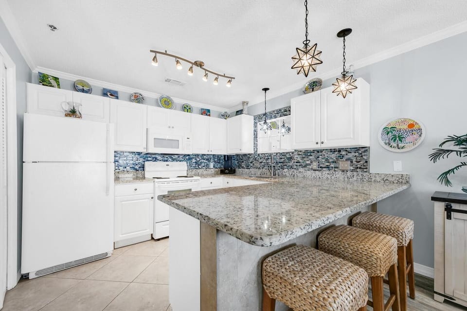 Condo, Multiple Beds (Gulf Place Caribbean 313- Sunsets on ) | Private kitchen | Oven, toaster