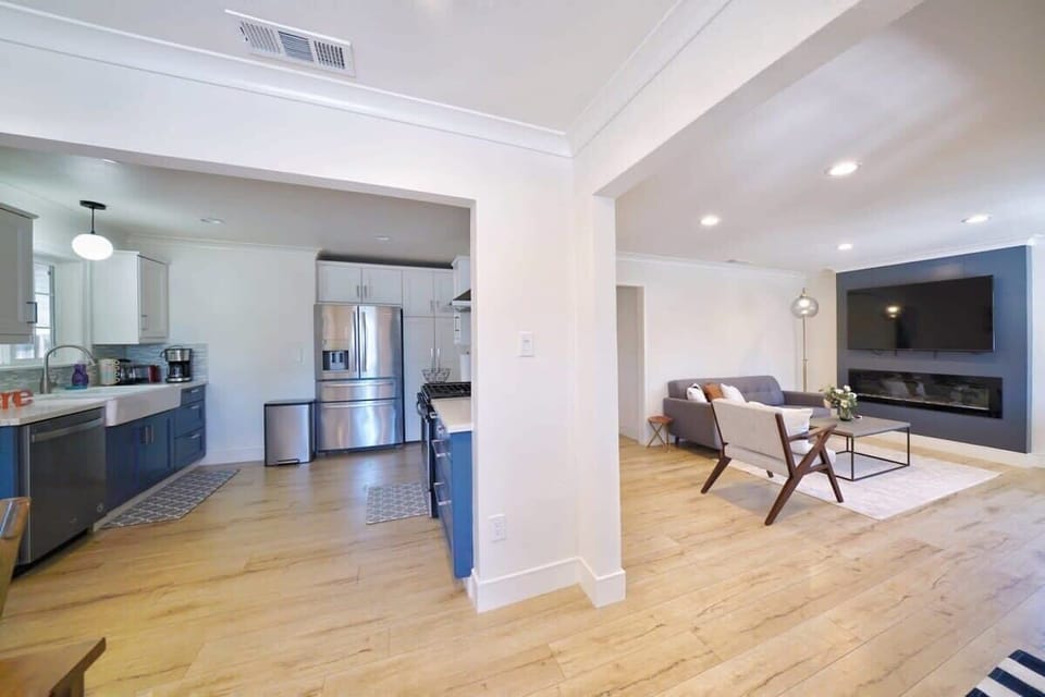 House, Garden View (4 Bedrooms) | Living area | 43-inch flat-screen TV with cable channels, fireplace