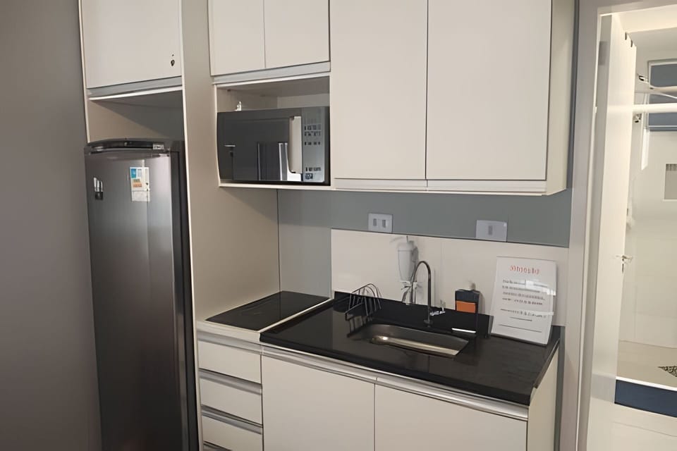 Suite | Private kitchen | Shared fridge, microwave, oven, toaster