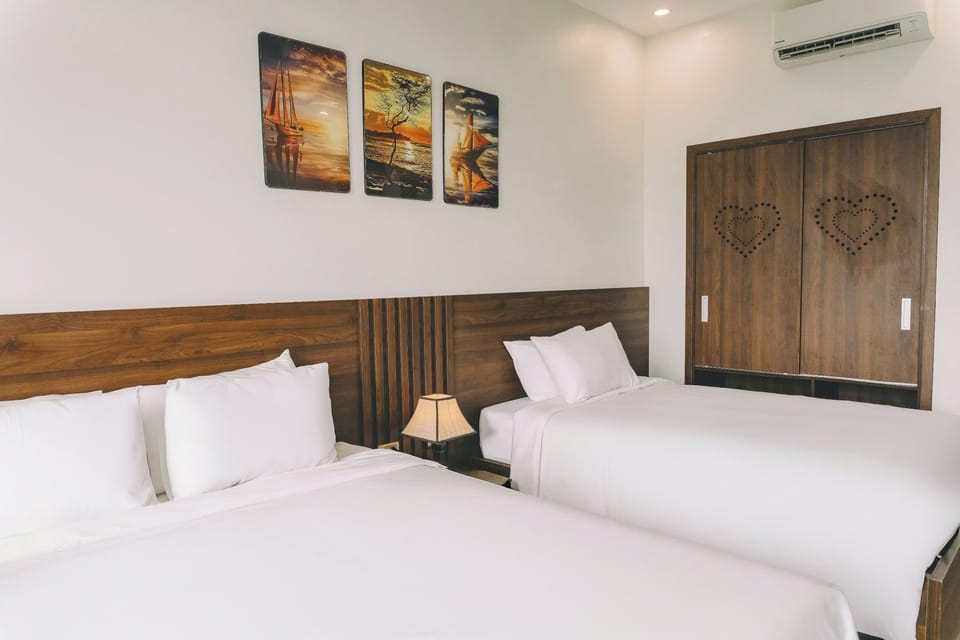 Deluxe Triple Room, Non Smoking, Balcony | Desk, laptop workspace, blackout drapes, soundproofing
