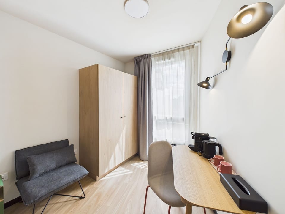 Standard Double Room | Living area | 80-cm flat-screen TV with cable channels