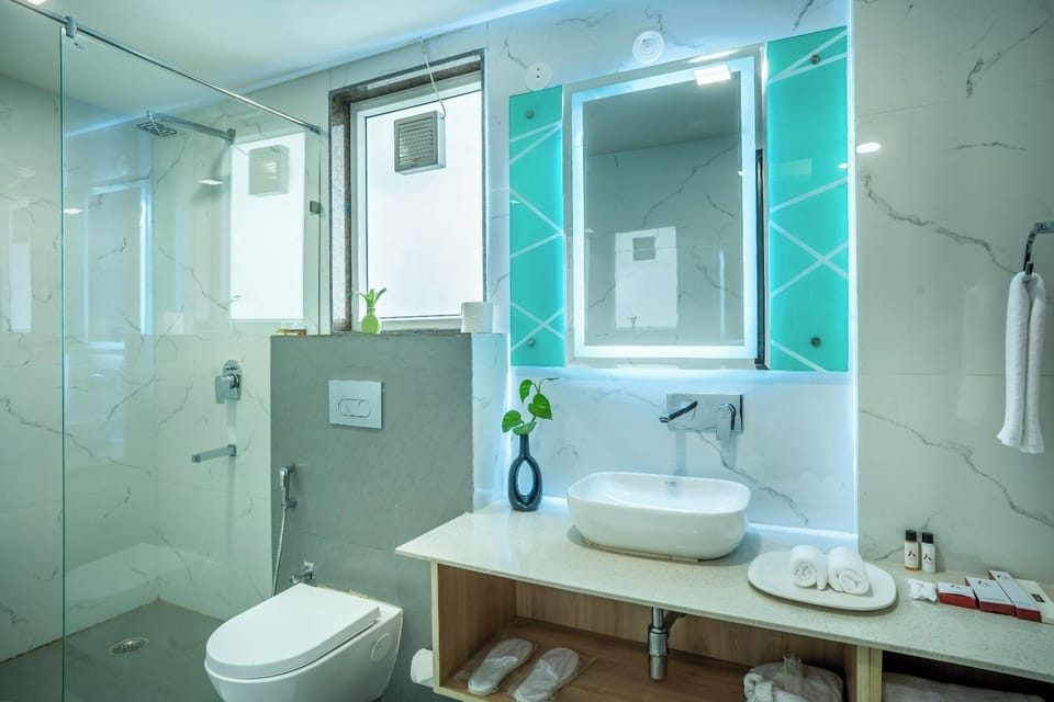 Classic Double Room, Balcony, City View | Bathroom | Shower, hair dryer, towels, soap