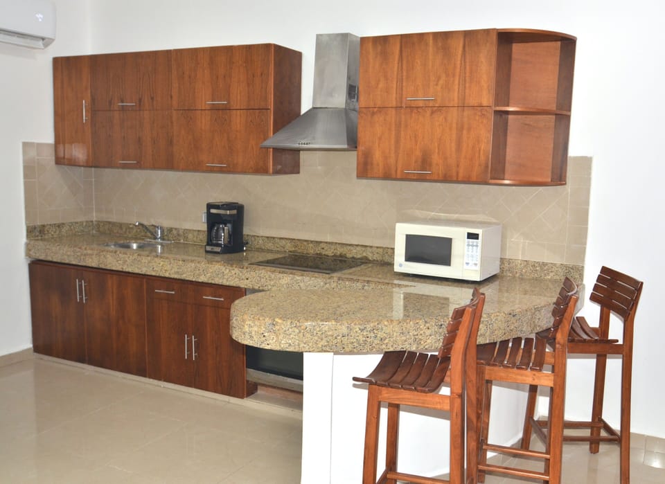 Family Apartment, Balcony, City View | Private kitchen | Fridge, microwave, cookware/dishes/utensils