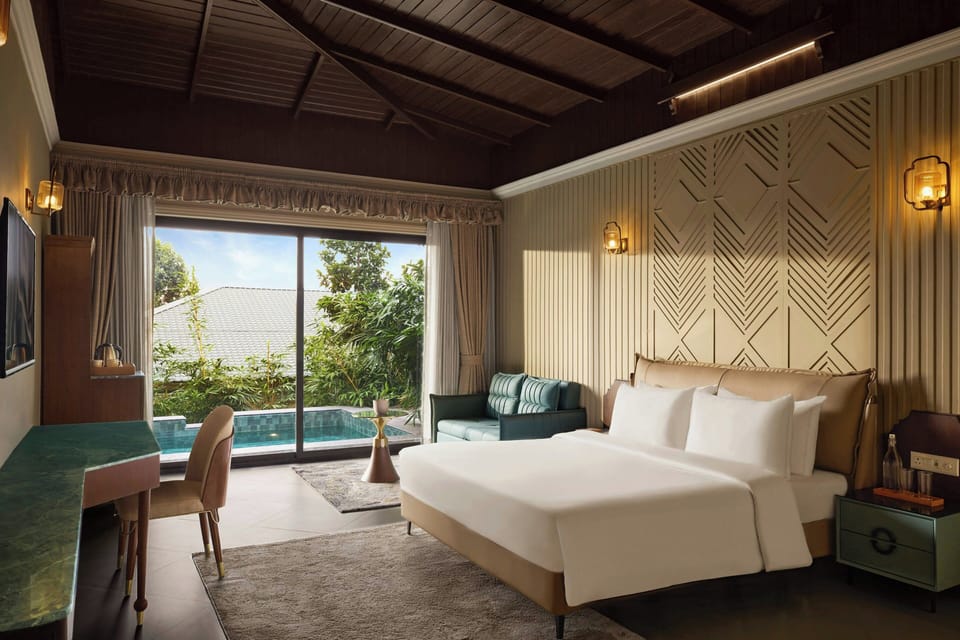 Premium Room, 1 King Bed, Garden View | Pool | Outdoor pool, pool umbrellas