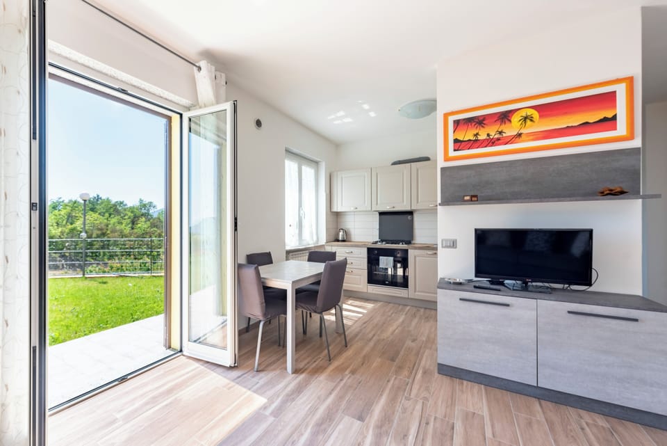 Apartment, 1 Double Bed with Sofa bed, Mountain View | Living area | 32-inch LED TV with digital channels