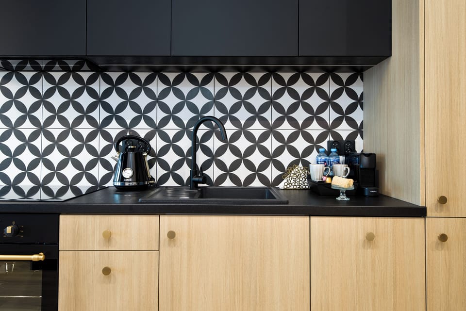 Luxury Apartment, City View | Private kitchen | Full-size fridge, oven, stovetop, dishwasher