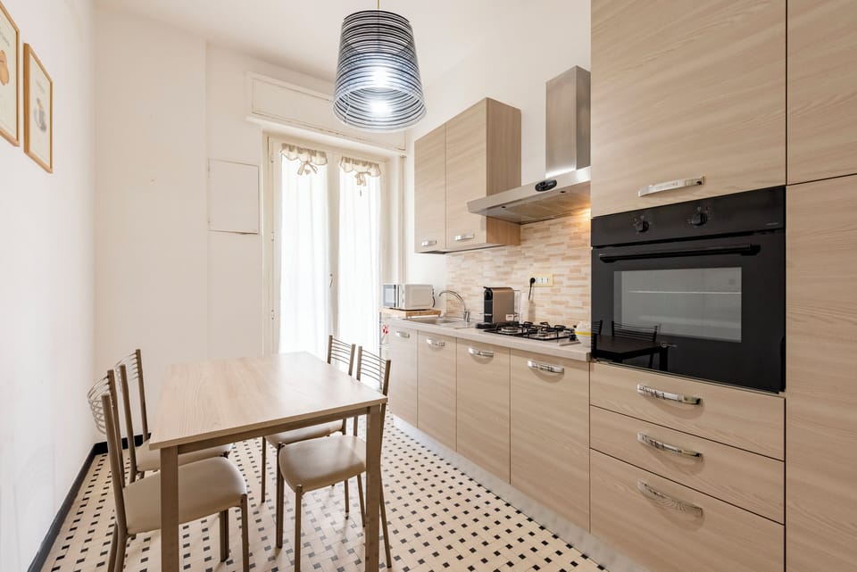 Apartment, 2 Bedrooms, Balcony | Private kitchen | Cookware/dishes/utensils, dining tables