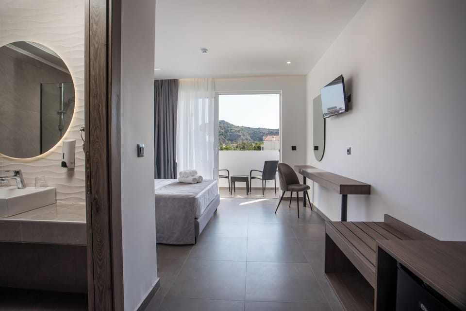 Classic Double or Twin Room, Balcony, Garden View | In-room safe, blackout drapes, soundproofing, iron/ironing board