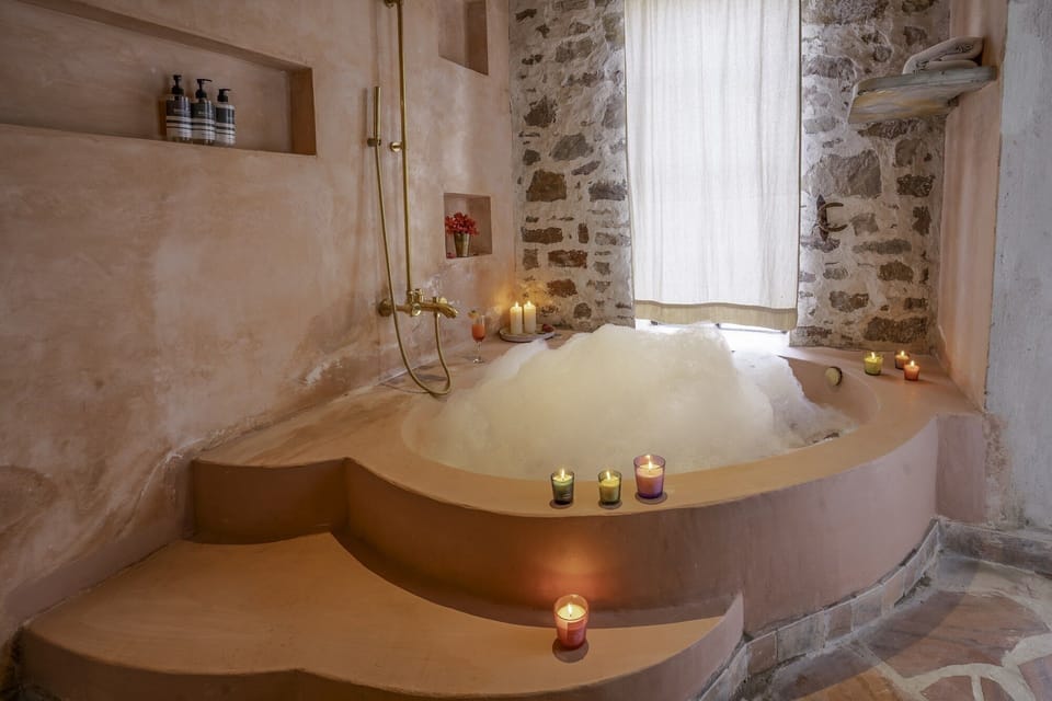 Luxury Room, Mountain View | Bathroom | Separate tub and shower, hair dryer, slippers, towels