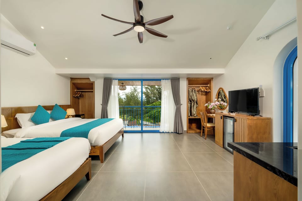 Superior Triple Room, Balcony, Partial Ocean View | Beach/ocean view