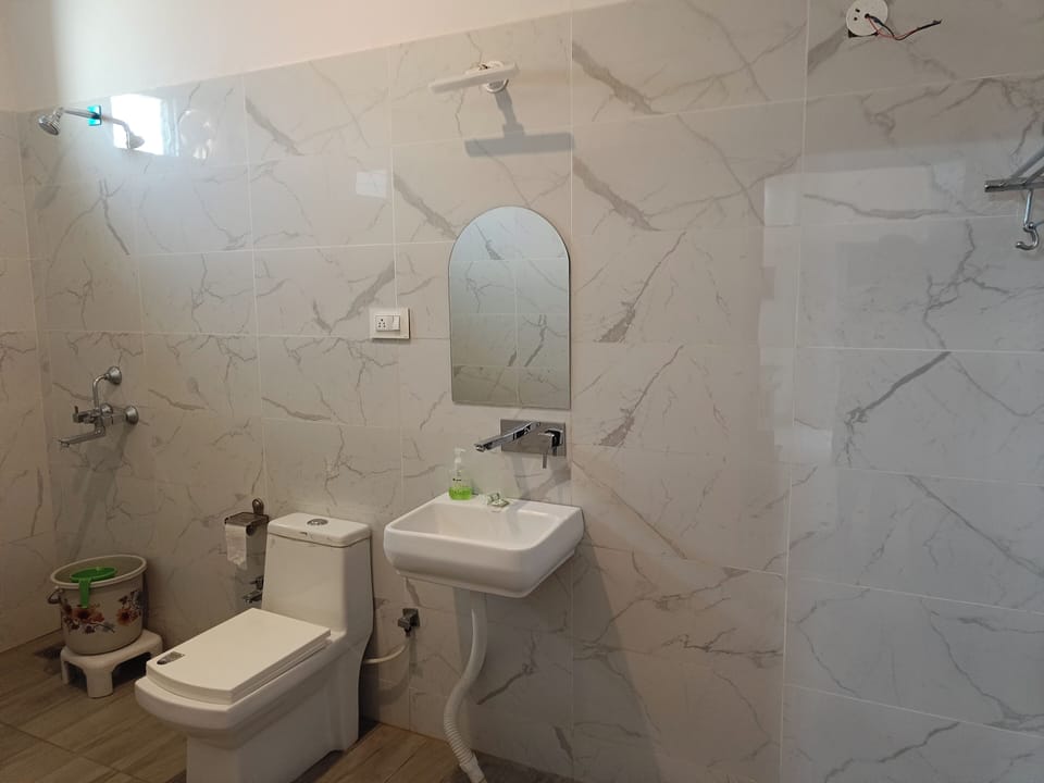 Shower, bathrobes, towels, soap
