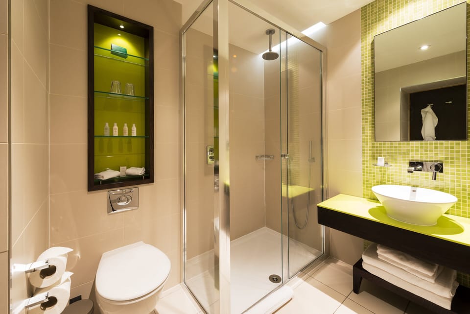Shower, rainfall showerhead, designer toiletries, hair dryer