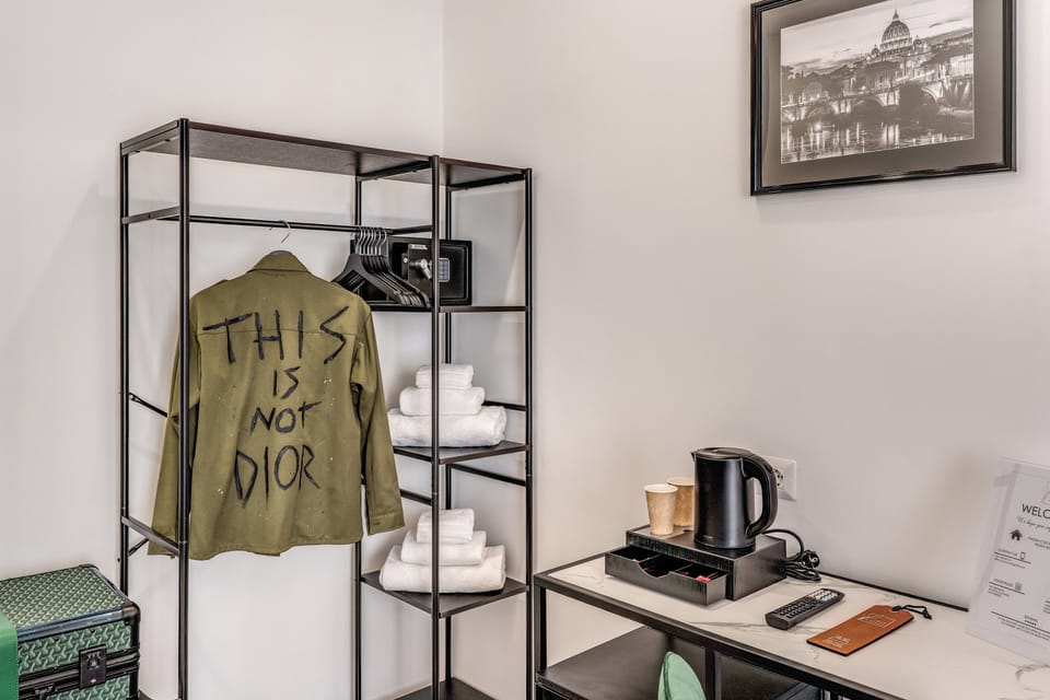 Deluxe Room, City View | In-room safe, desk, laptop workspace, blackout drapes