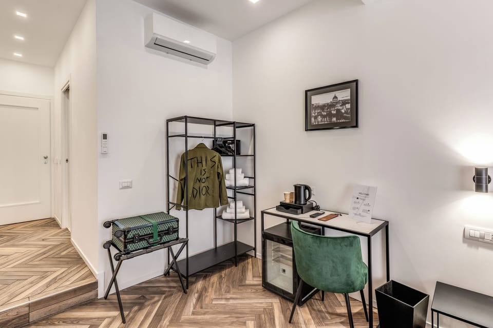 Deluxe Room, City View | In-room safe, desk, laptop workspace, blackout drapes