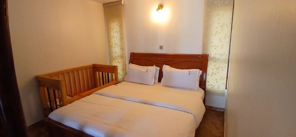 Family Villa, Balcony | In-room safe, desk, laptop workspace, iron/ironing board