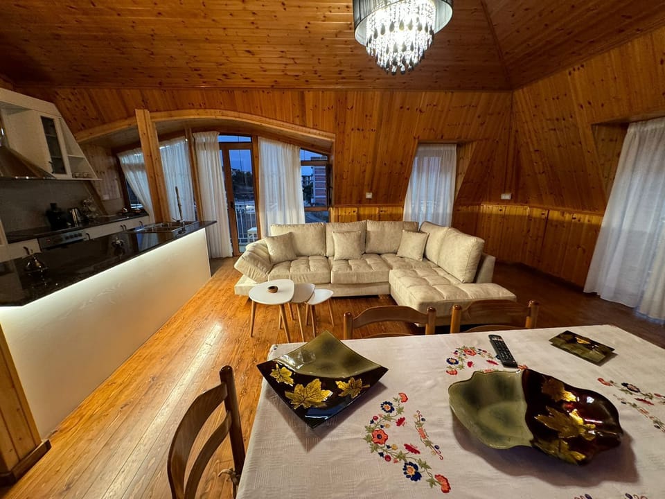 Family Suite, Sea View | Living room | 60-cm Smart TV with satellite channels