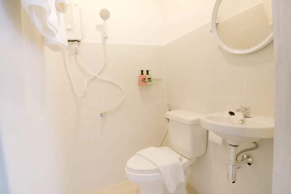 Shower, rainfall showerhead, hair dryer, towels