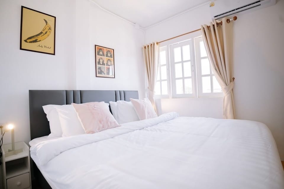 Minibar, desk, bed sheets