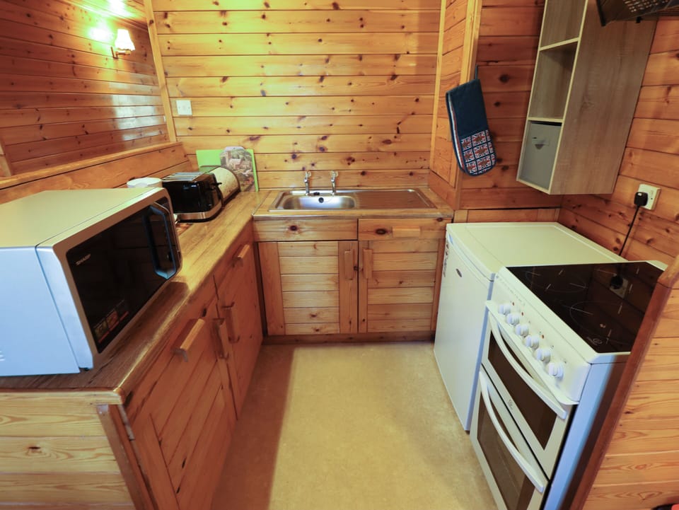 Fridge, microwave, toaster, cookware/dishes/utensils