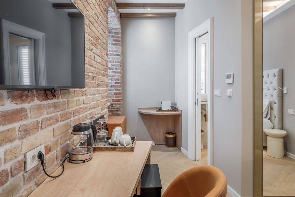 Deluxe Double Room, City View | Minibar, in-room safe, desk, laptop workspace