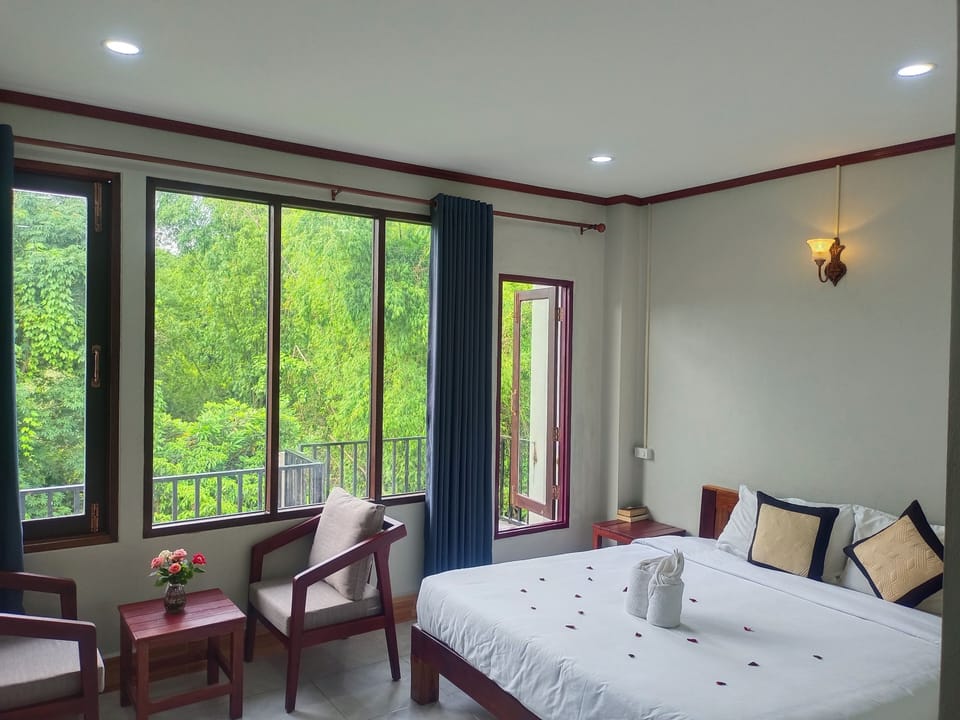 Deluxe Double Room, Balcony, Mountain View | Desk, laptop workspace, free WiFi, bed sheets