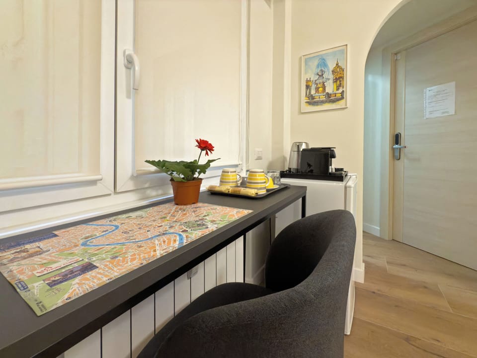 Quadruple Room, Private Bathroom | Minibar (free items), in-room safe, desk, laptop workspace