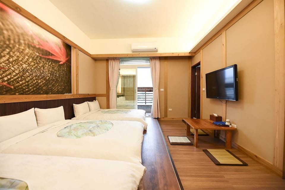 Family Room | Down comforters, desk, blackout drapes, soundproofing