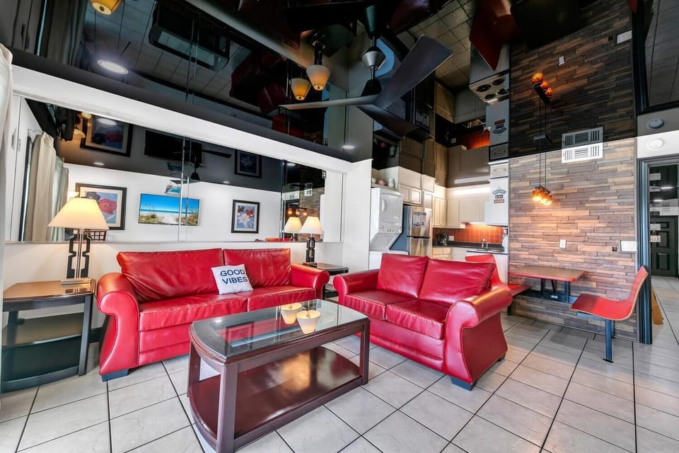 Condo, 1 King Bed with Sofa bed (The Summit 1014) | Living area | TV