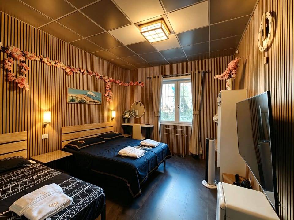 Basic Triple Room, Shared Bathroom | Desk, blackout drapes, iron/ironing board, free WiFi